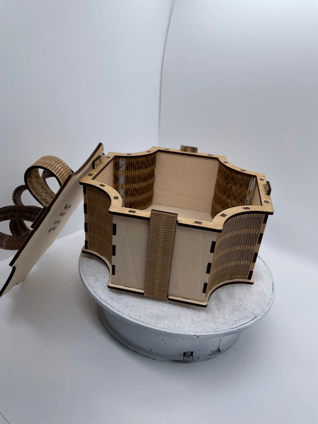 Boîte en bois façon paquet cadeaux